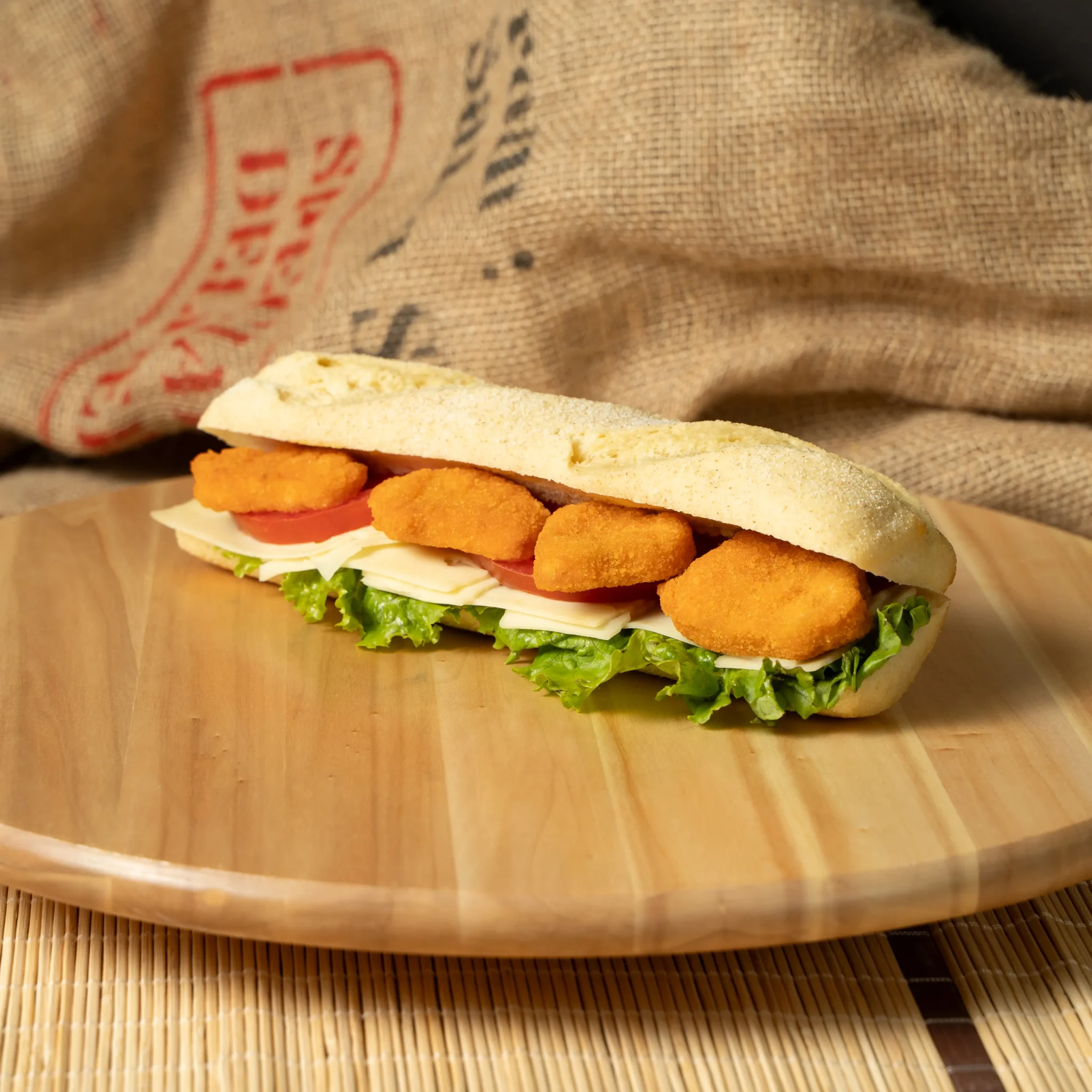 Sandwich with chicken nuggets and cheese