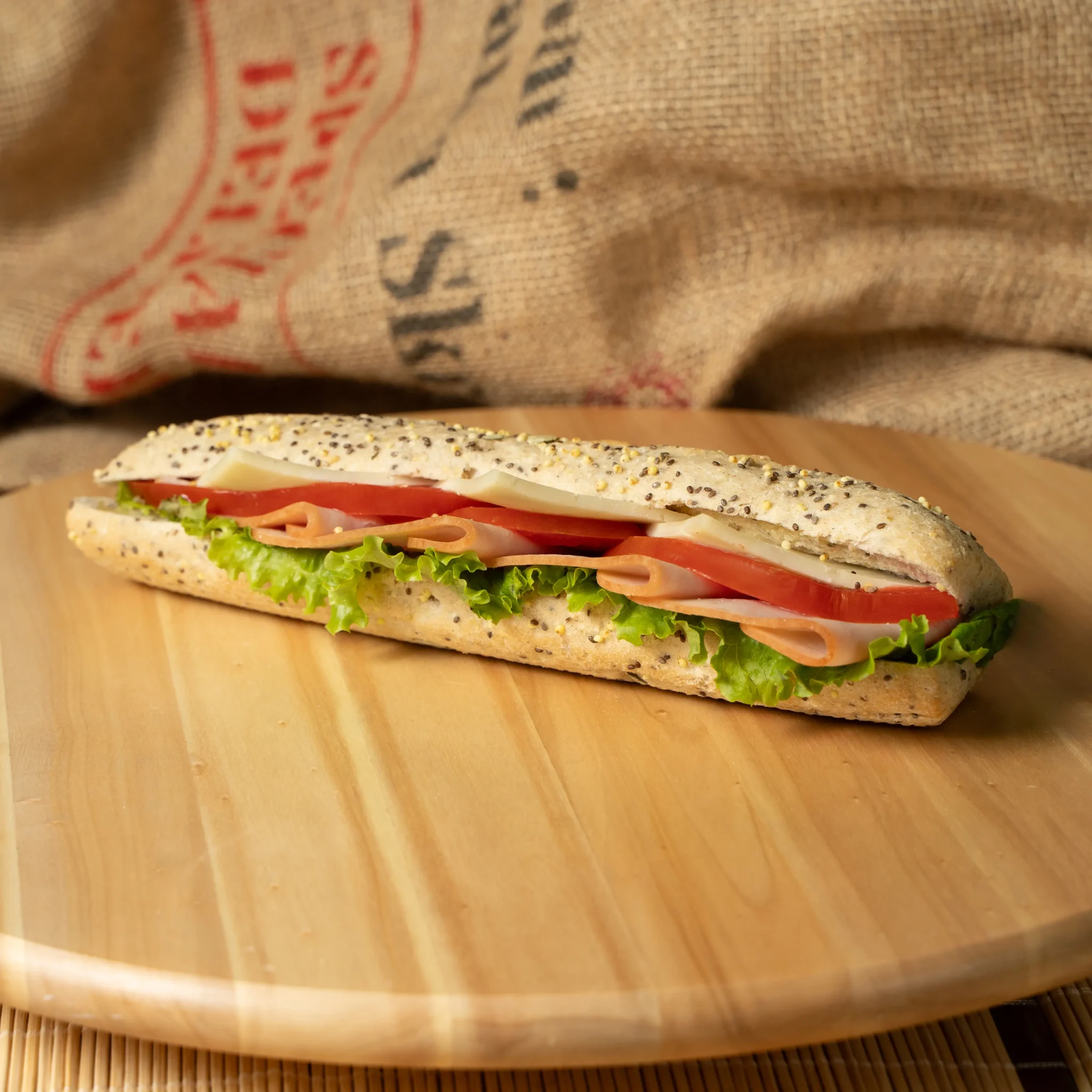 Tomato , lettuce and ham sandwich